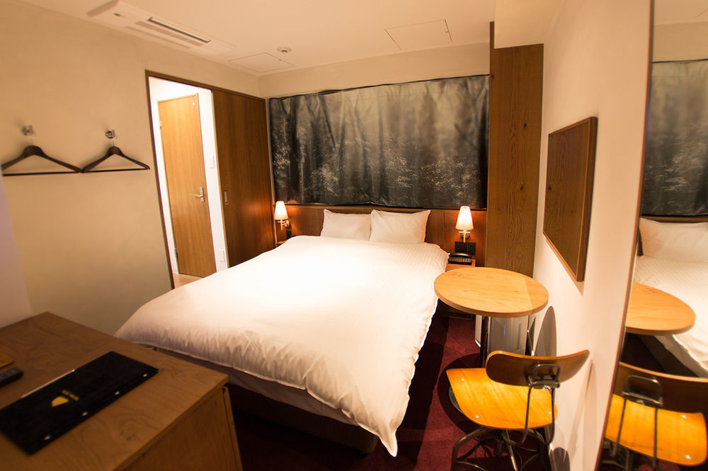 The Wall Hotel Osaka Esterno foto